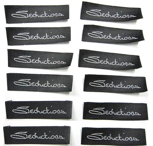 Silver Letters In Black Cloth Labels